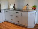 Kitchen featuring stainless steel bench